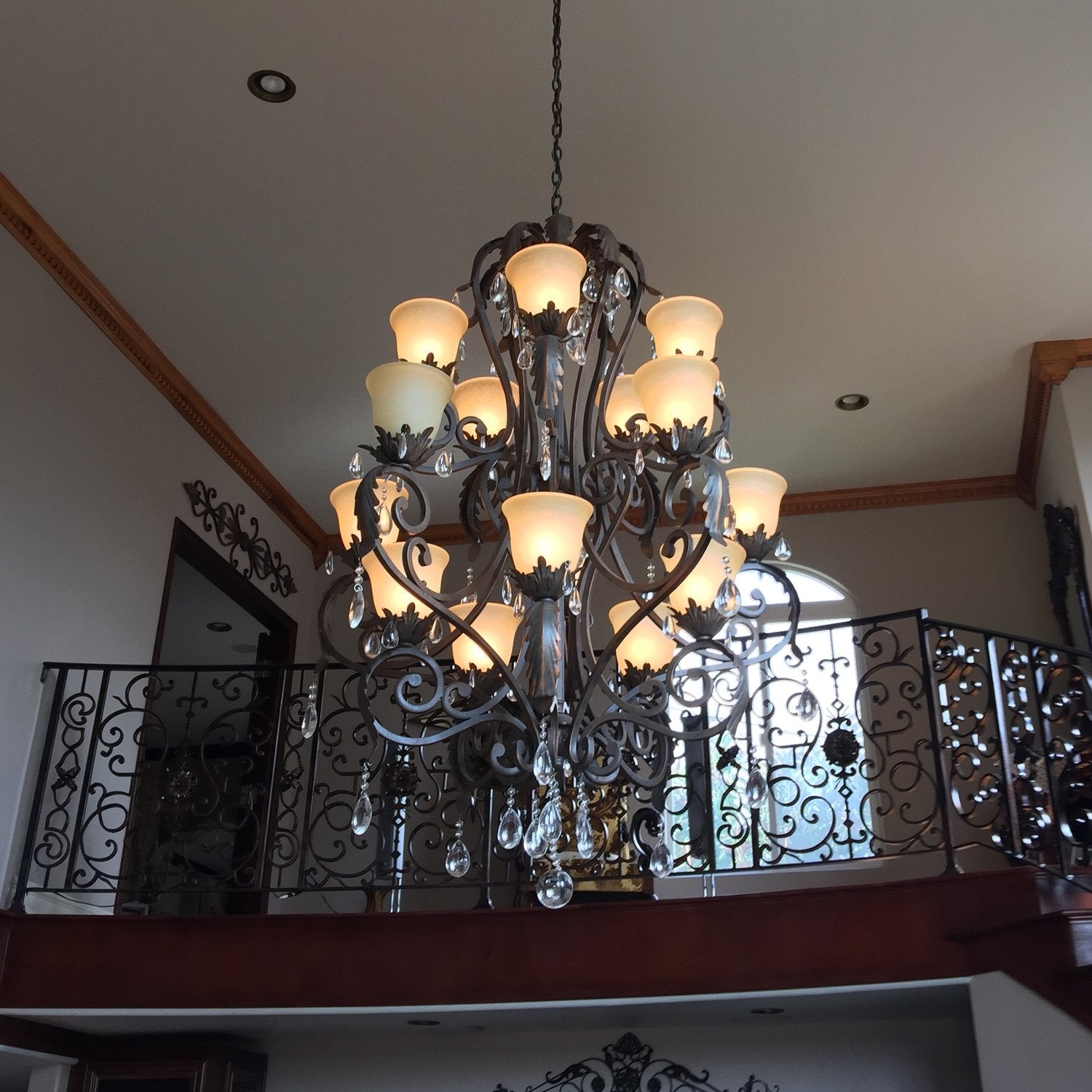 Get a free estimate for the lighting installation of your vintage iron crystal chandelier in California.